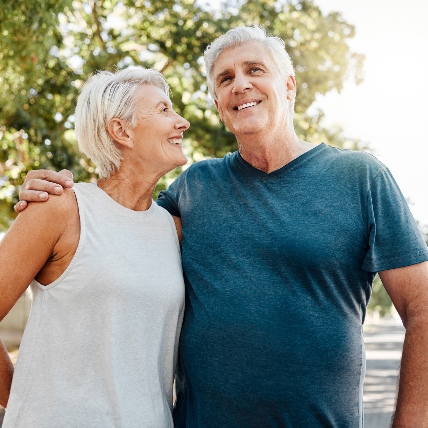 Senior couple smile after running for exercise, fitness and health in retirement together. Elderly runners rest after workout, doing low impact cardio run and sports training to stay healthy in life